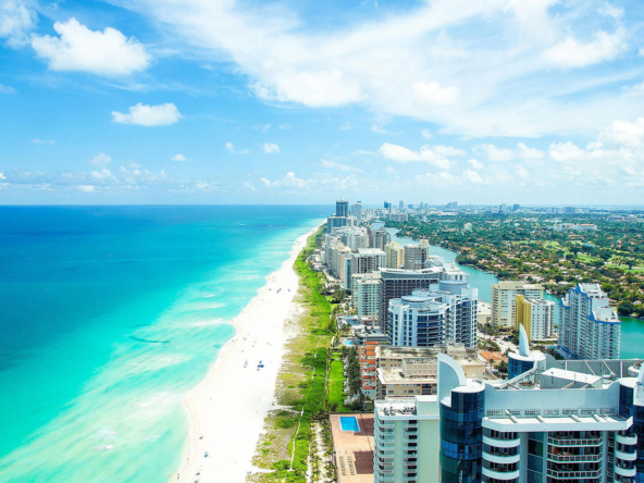A view of the ocean and beach from above.